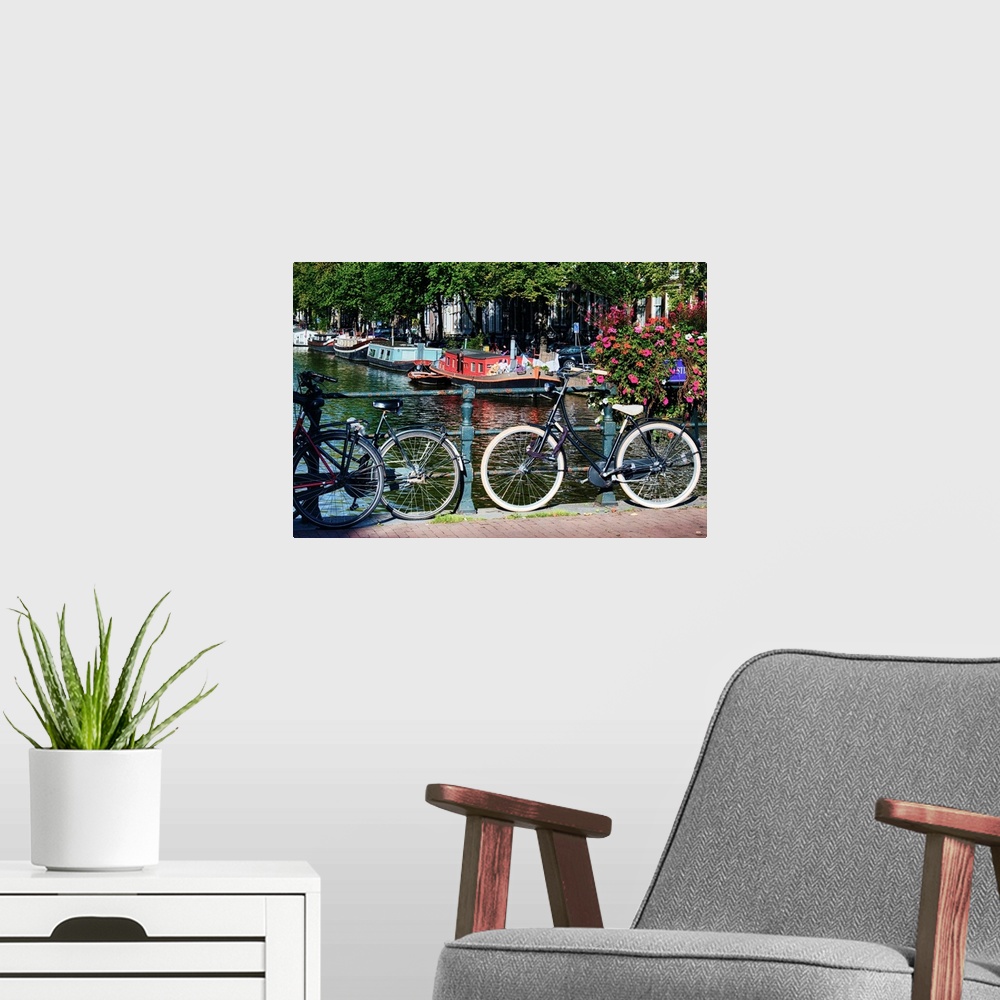A modern room featuring Classic bicycles on a bridge, Amsterdam, Netherlands.