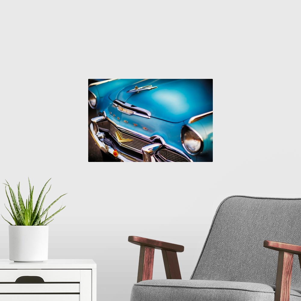 A modern room featuring Front close up of a 1956 Desoto Firedome Two Door Hardtop, Classic American Automobile.