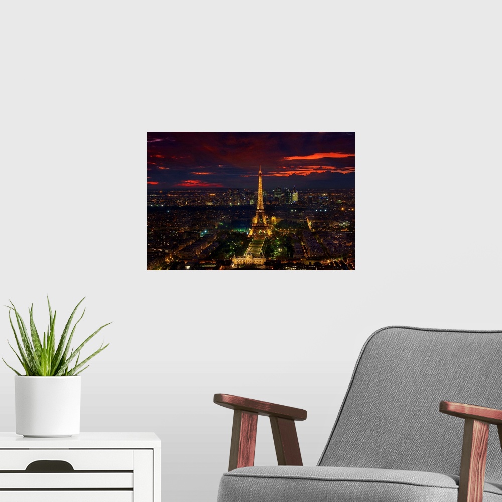 A modern room featuring Eiffel Tower at Sunset