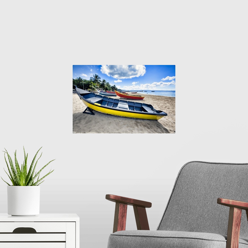 A modern room featuring Low angle view of colorful, small wooden, fishing boats on a Caribbean beach, Crash Boat Beach, A...
