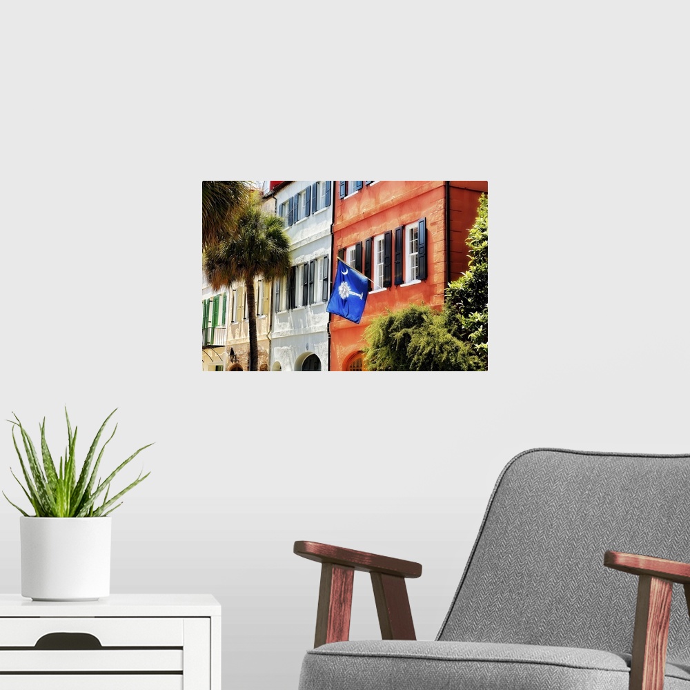 A modern room featuring Low Angle View of Colorful House Exteriors with a Flag, Charleston, South Carolina