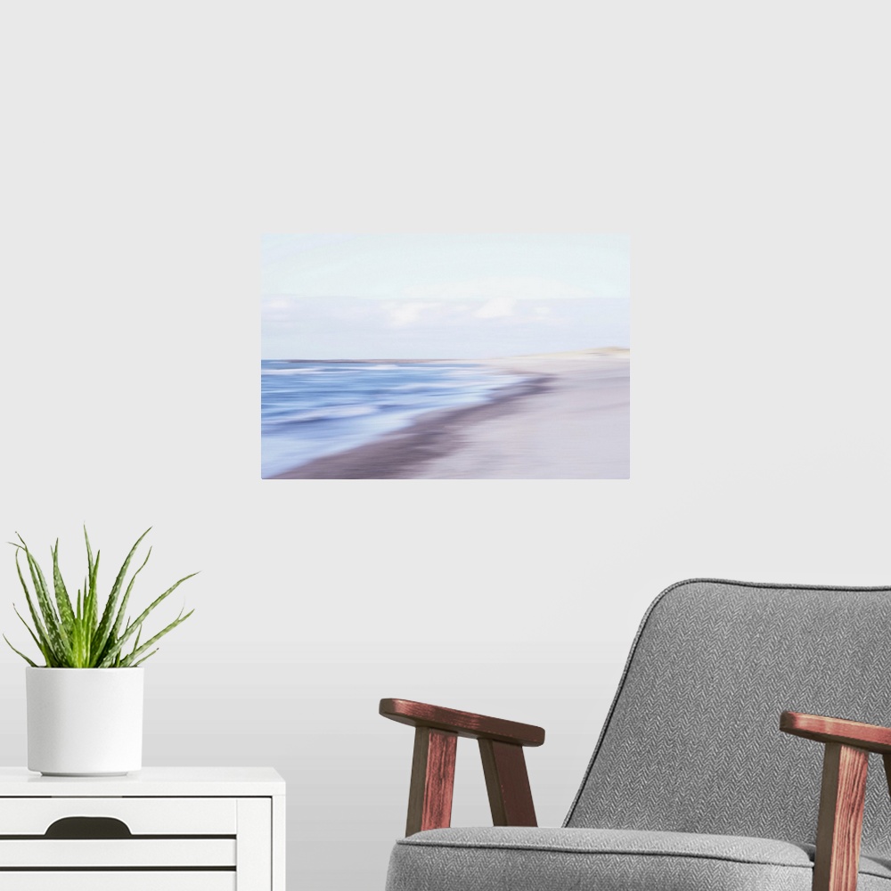 A modern room featuring Artistically blurred photo. The waves find a place to rest on the North Sea beach of North Jutlan...