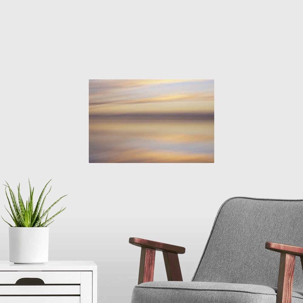 A modern room featuring Artistically blurred photo. Sunlit clouds are flirting with their reflection in the water of a lake.