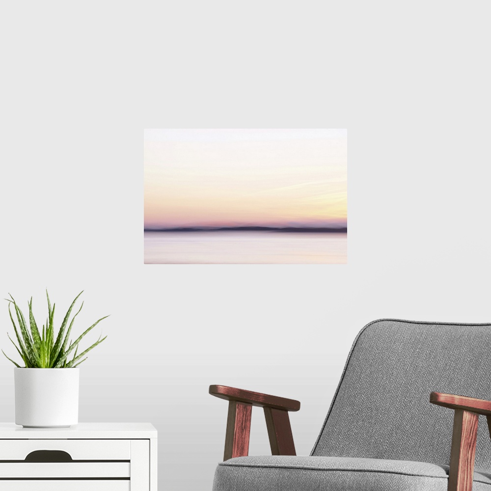 A modern room featuring Artistically blurred photo. A sunset like a fairy tale when the sun is kissing us goodnight.
