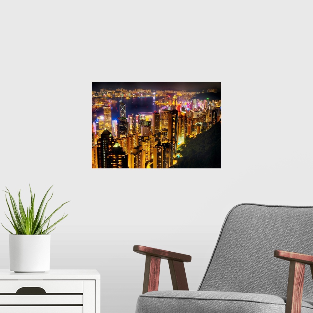 A modern room featuring High angle view of Hong Kong night skyline from the Victoria Peak.