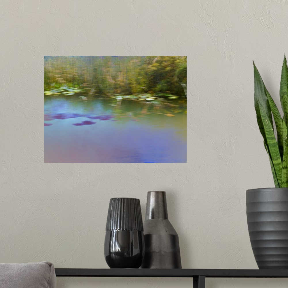 A modern room featuring Blurred photograph of a pond landscape created with multiple exposures.