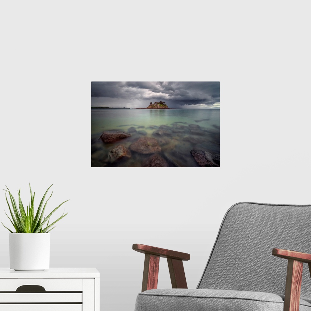 A modern room featuring Long time exposure of the shorecoast of Ile du Guesclin island and castle in Brittany, a view at ...