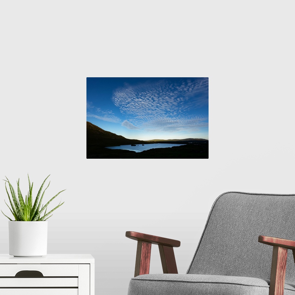 A modern room featuring Cloudy blue sky over a lake in Ireland