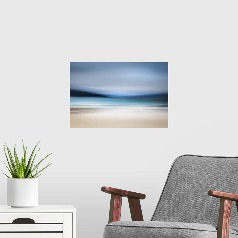 A modern room featuring Calming abstract landscape beach scene with mountains, teal water, and grey sky.