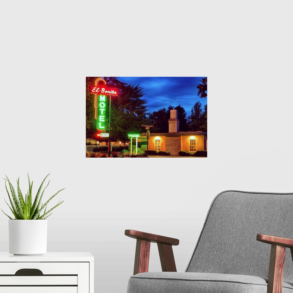 A modern room featuring Fine art photo of a motel in Napa Valley with bright neon signs.