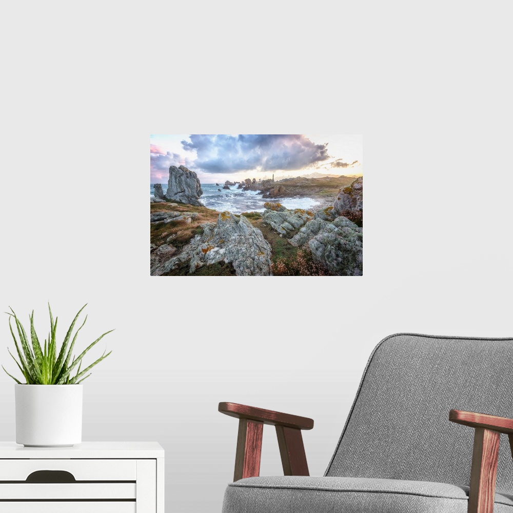 A modern room featuring Fine art photo of a lighthouse on a rocky shore in the north of France.
