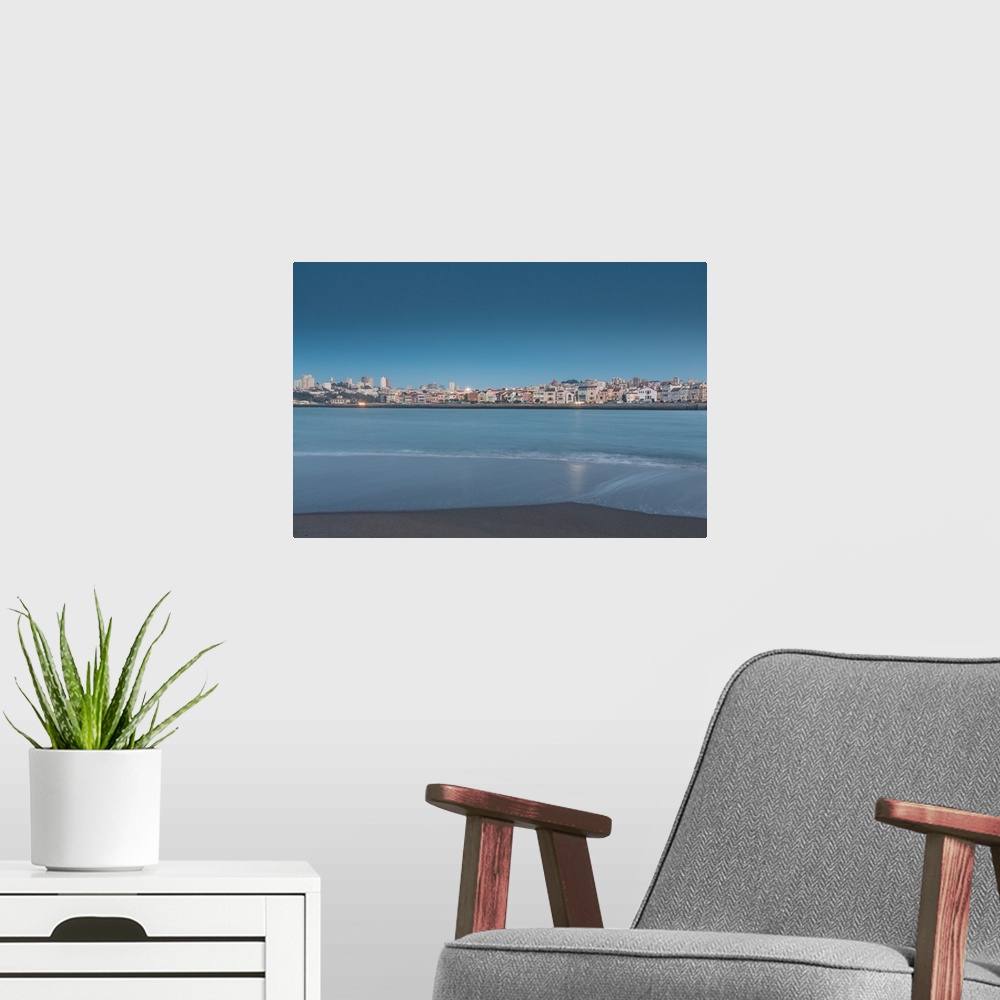 A modern room featuring Long exposure of Marina district, San Francisco, during the blue hour of sunset.