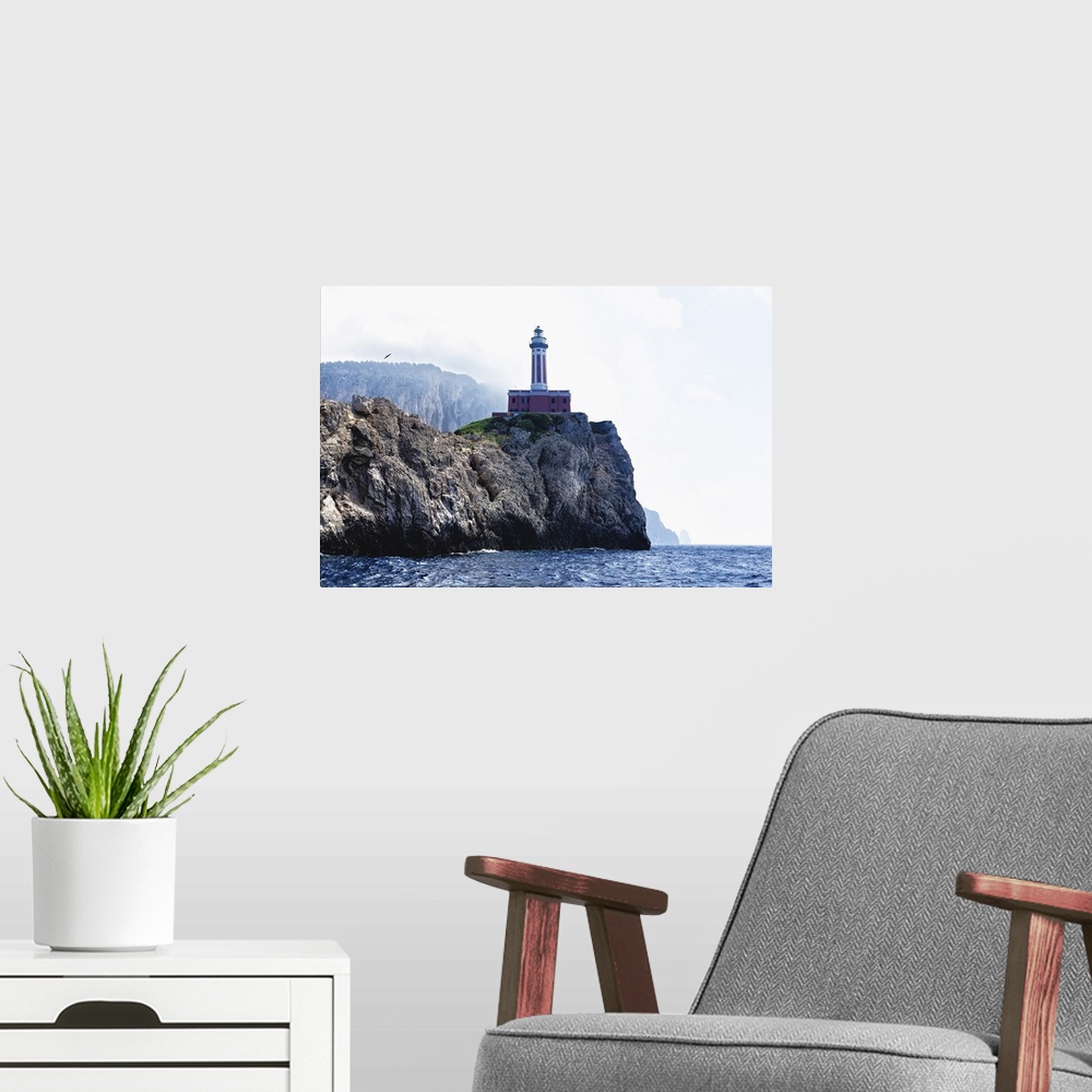 A modern room featuring Low Angle View of the Punta Carena Lighthouse, Anacapri, Campania, Italy.
