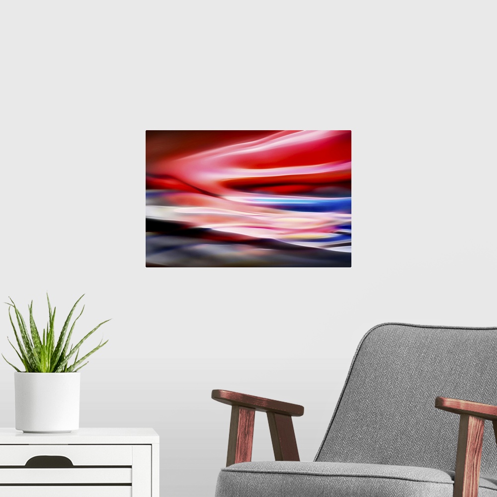 A modern room featuring Abstract representation of a very red dawn or sunset.