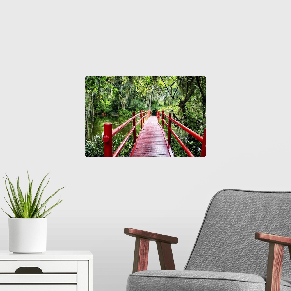 A modern room featuring View of a Red Wooden Footbridge in a Southern Marshy Garden, South Carolina