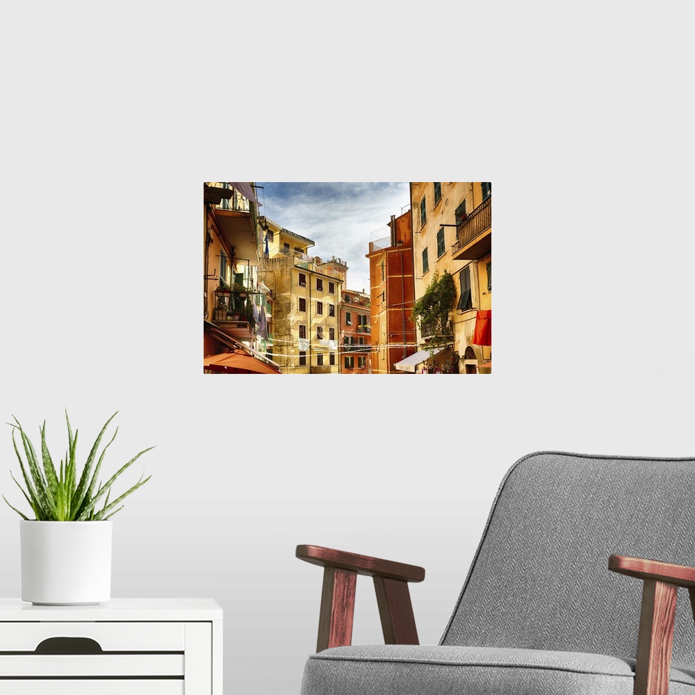A modern room featuring High Angle View of Building Facades ina Narrow Street, Riomaggio
