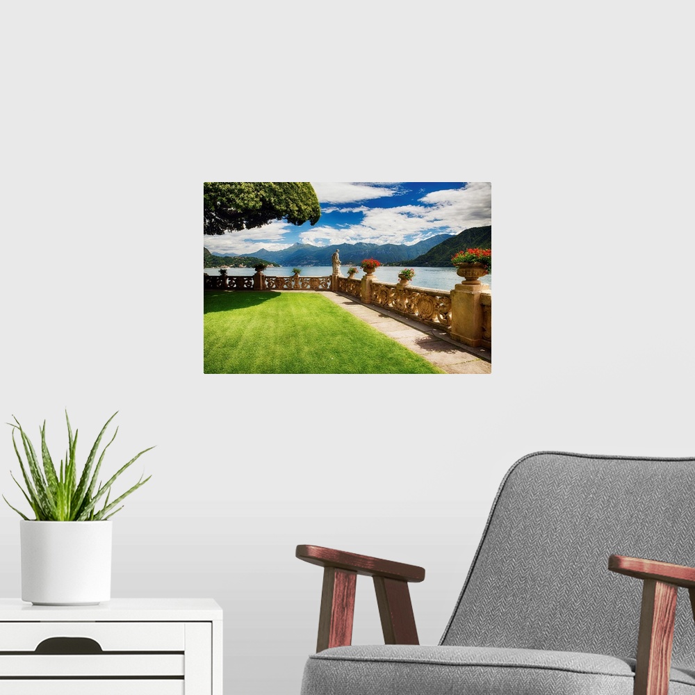 A modern room featuring Fine art photo of a Roman-style veranda overlooking Lake Como in Italy.