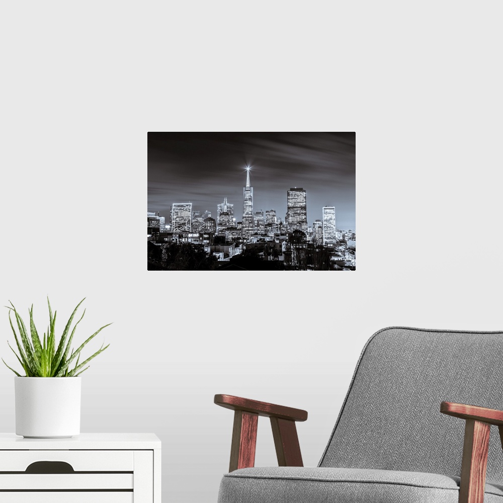A modern room featuring A black and white long exposure image of the skyline of financial district in San Francisco.
