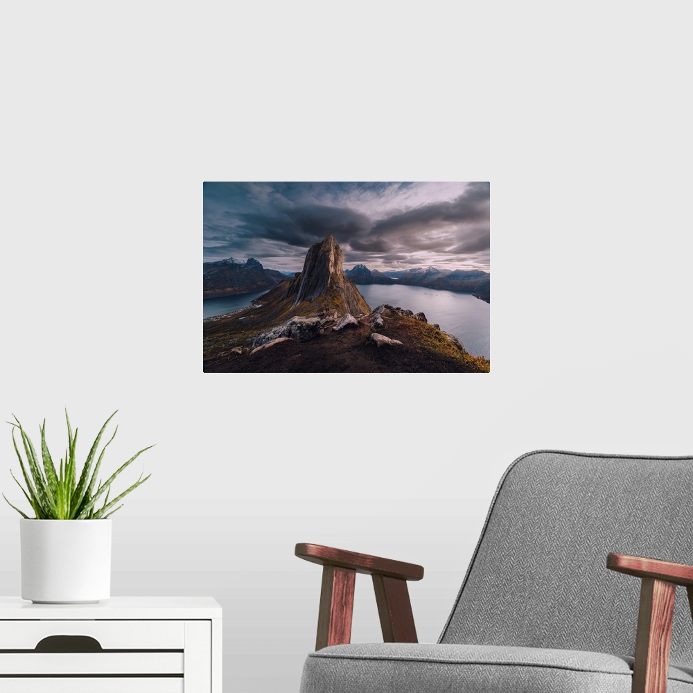 A modern room featuring Segla, the most iconic mountain peak in Senja, the second largest island in Norway.