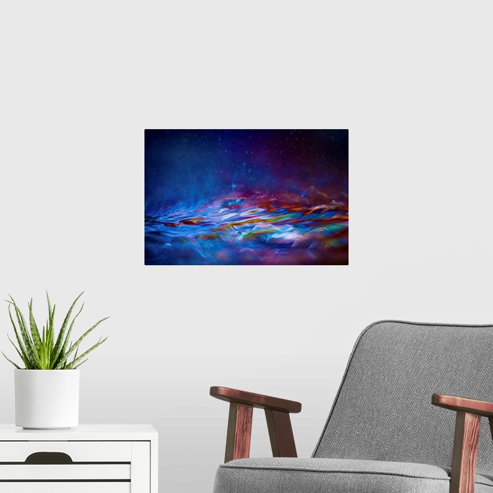 A modern room featuring Contemporary abstract painting of colorful waves and mist of soft glowing light.