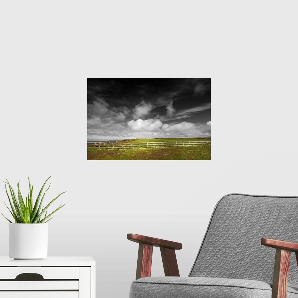 A modern room featuring Photograph of an idyllic countryside scene.