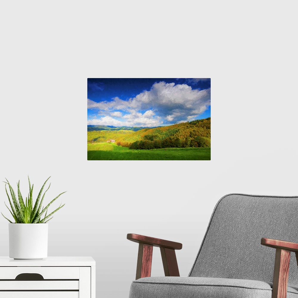 A modern room featuring A photograph of a countryside landscape under fluffy clouds.