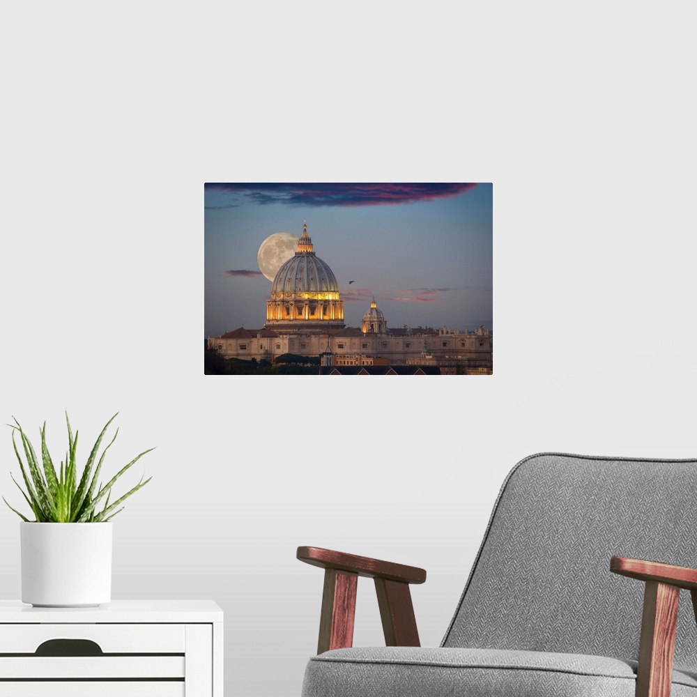A modern room featuring Fine art photograph of the moon rising right behind St. Peter's Basilica in Rome.