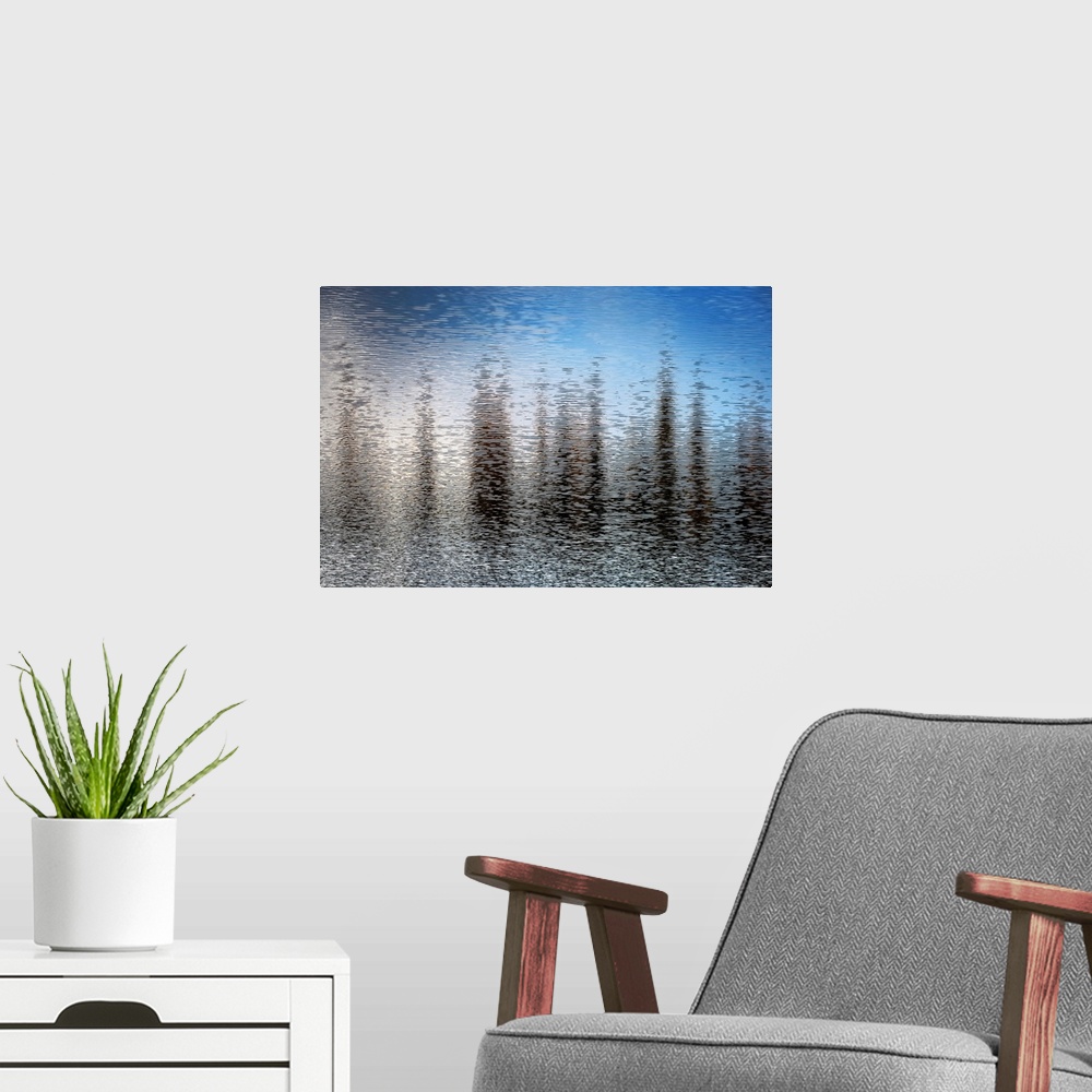 A modern room featuring Fine art photo of abstract shapes reflected in the rippling water of a lake.
