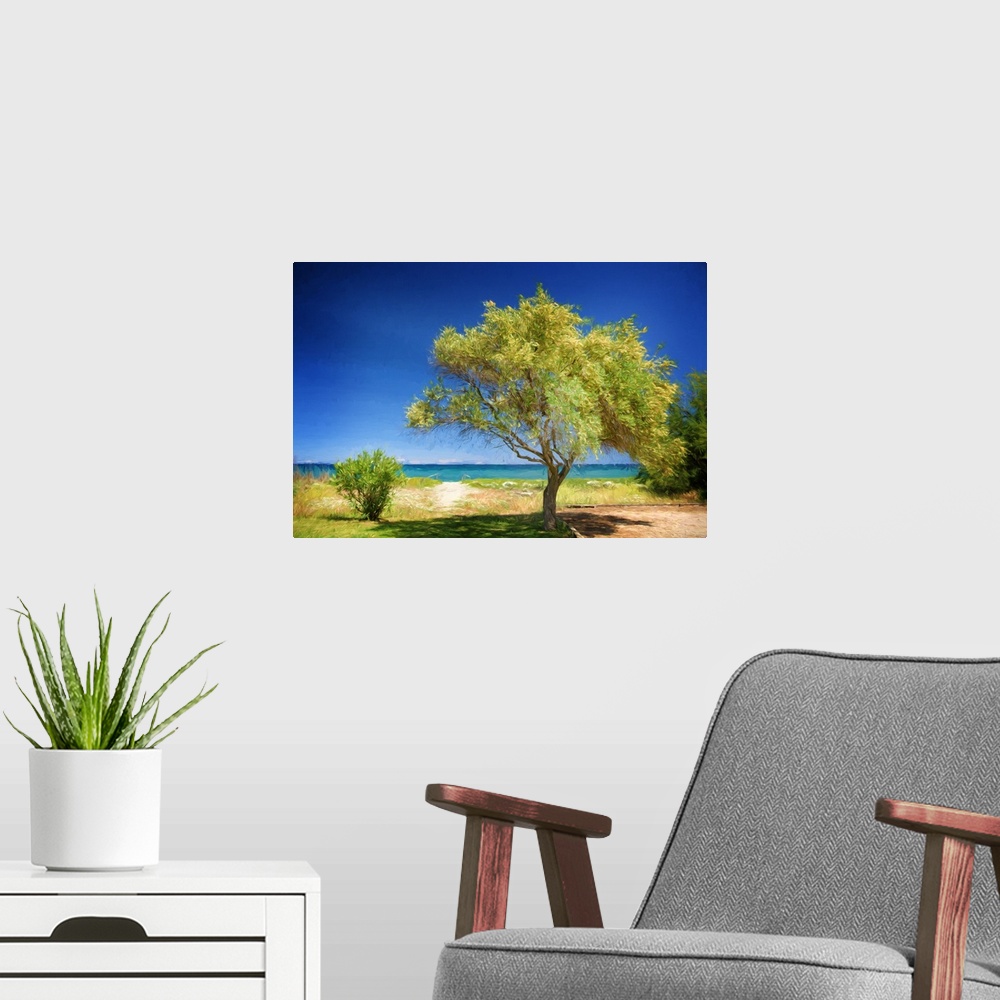 A modern room featuring Photo painting of a lush green tree blowing in the wind with a sandy path leading to the ocean in...