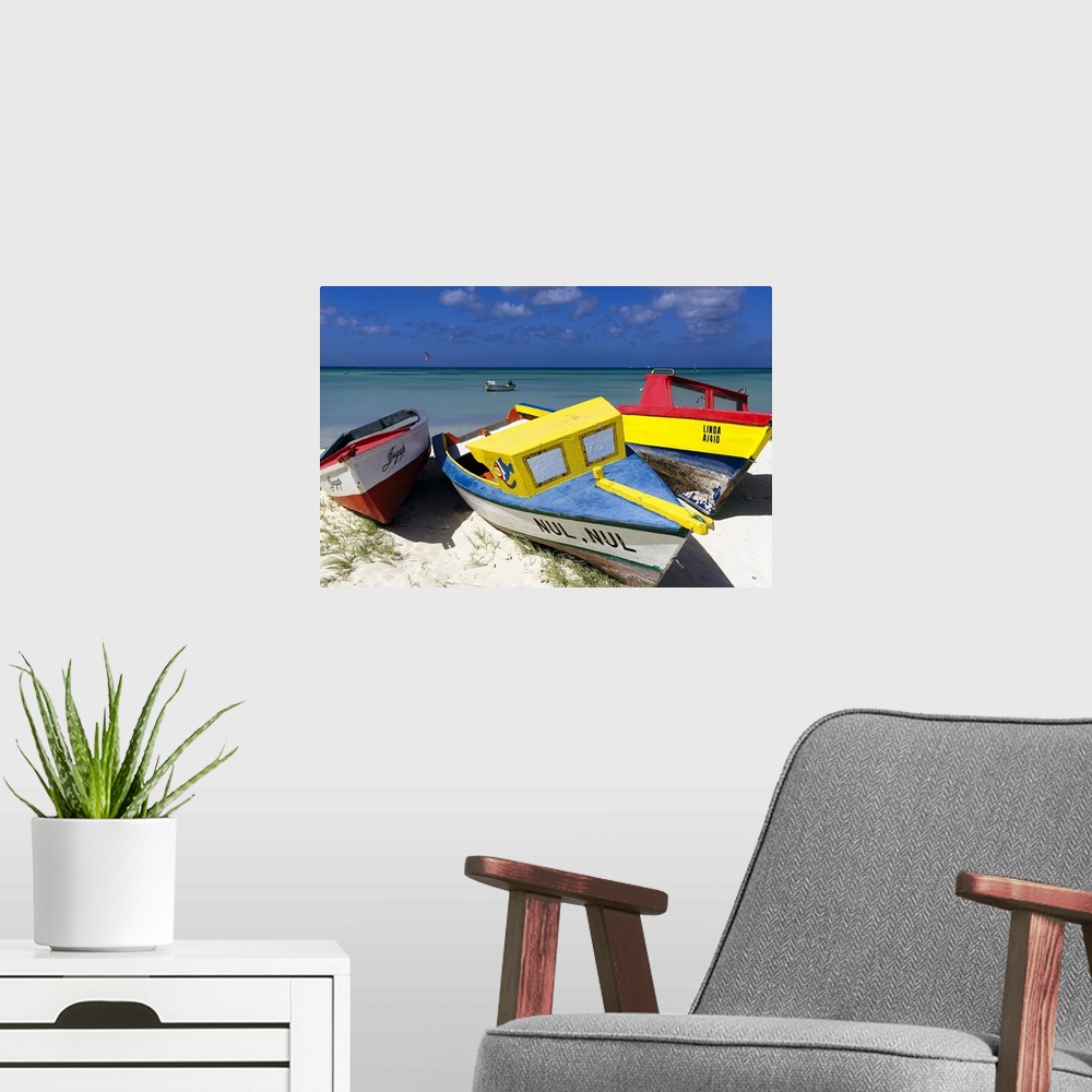 A modern room featuring A photograph of colorful boats sitting on the shore of a tropical beach.