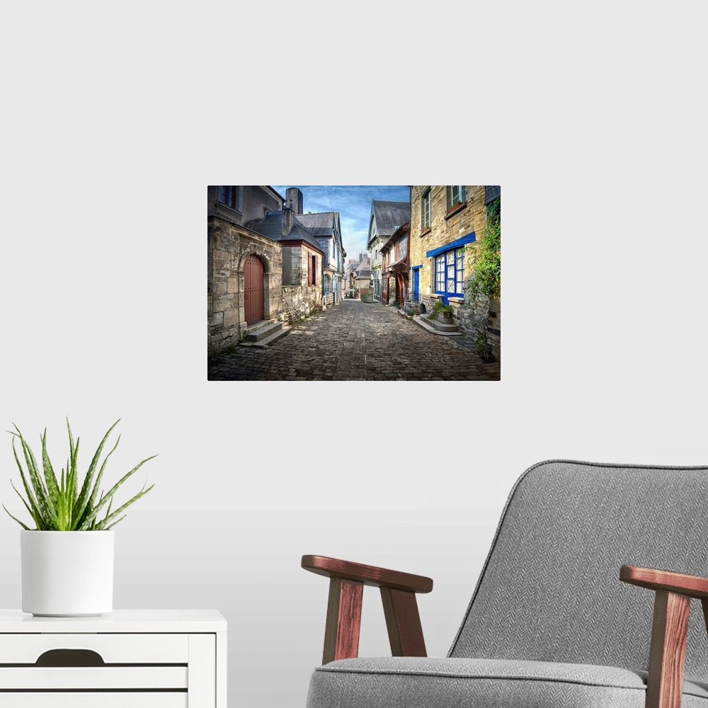 A modern room featuring Fine art photo of a street in a medieval town in the north of France.