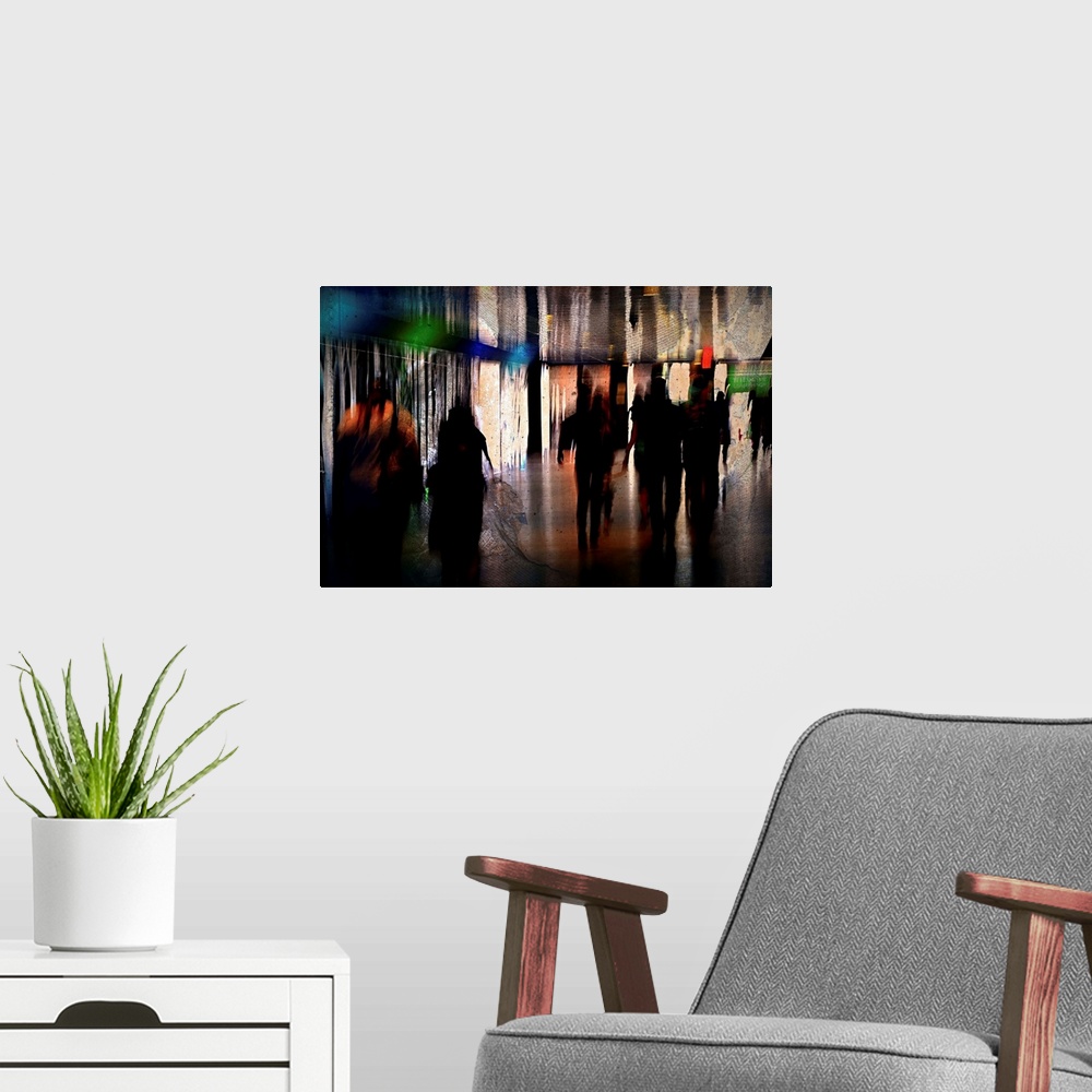 A modern room featuring Artistic photograph of silhouetted figures walking.
