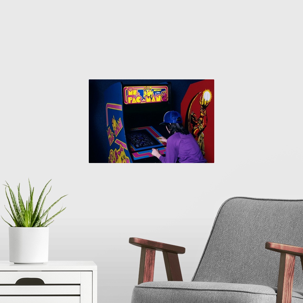 A modern room featuring 1980's  Teen Girl Playing Ms. Pac Man Video Game In Arcade