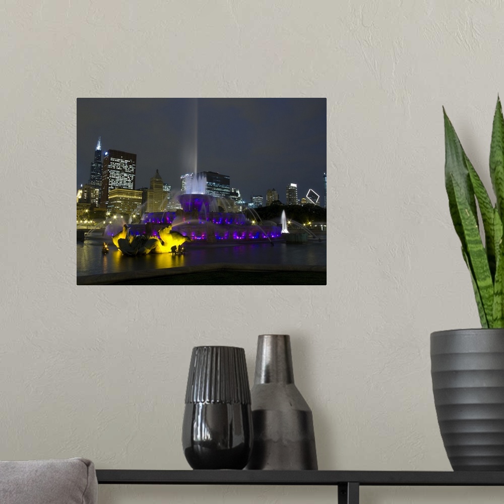 A modern room featuring Illuminated fountain with skyscrapers in a city, Buckingham Fountain, Grant Park, Chicago, Illinois,