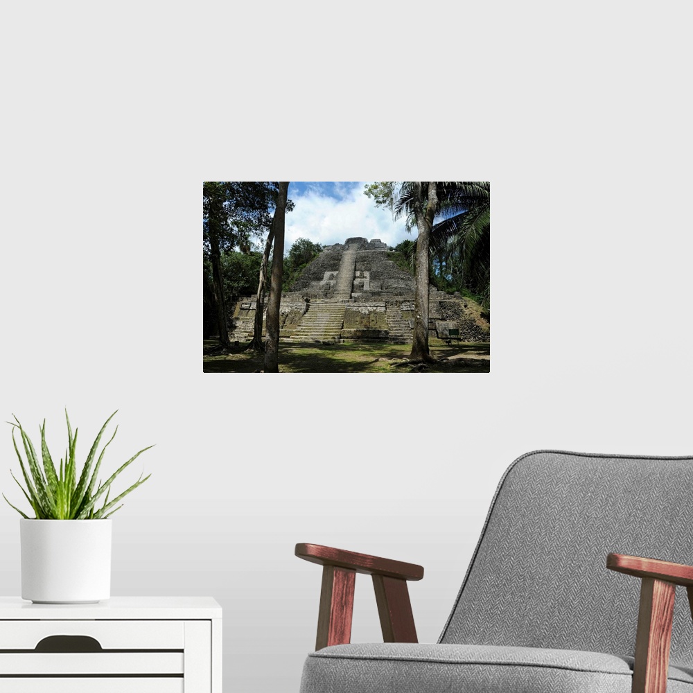 A modern room featuring Ruins of a temple, High Temple, Lamanai, Belize