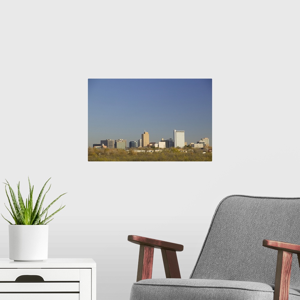 A modern room featuring Skyline of a city, Midland, Texas