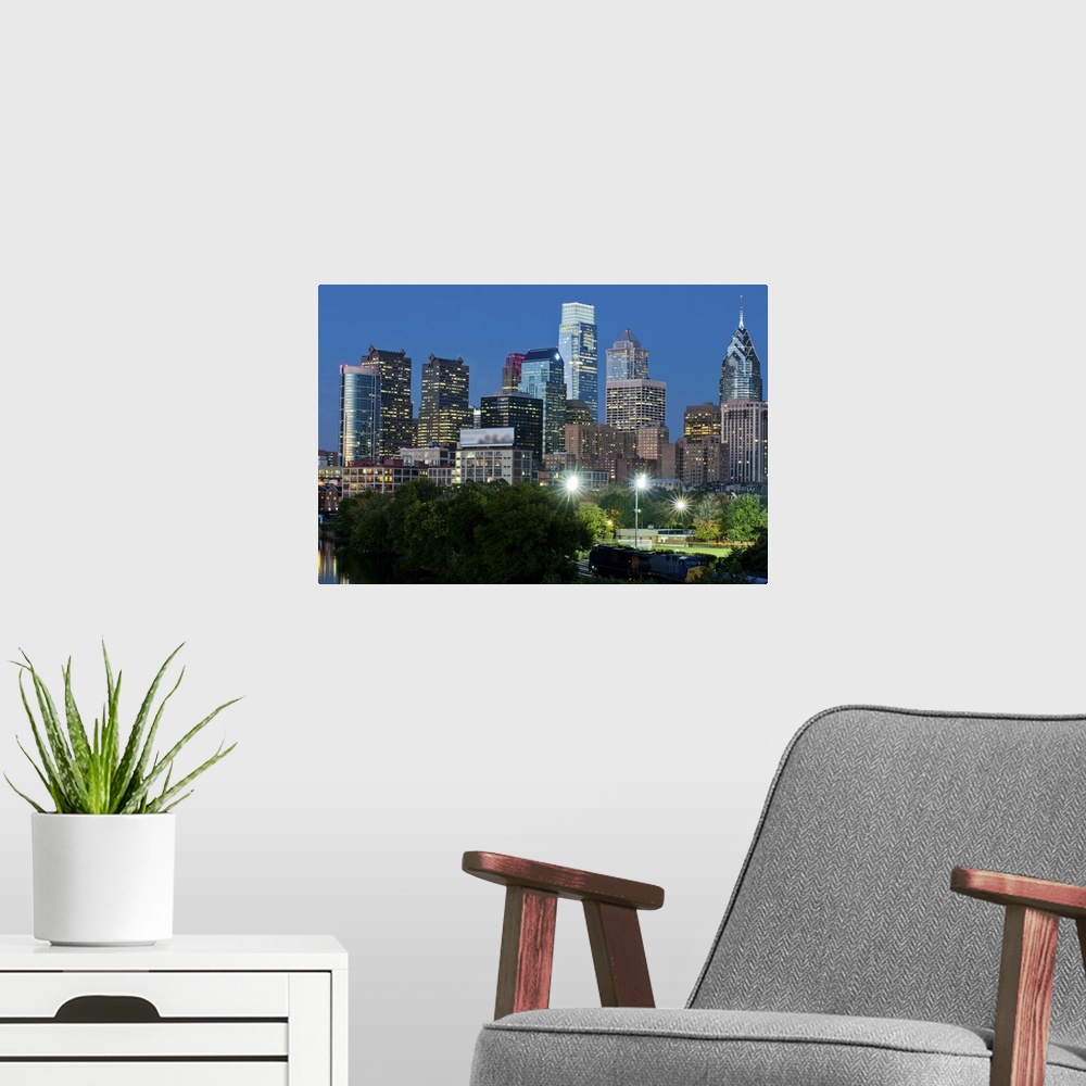 A modern room featuring Skyscrapers in a city at dusk, Philadelphia, Pennsylvania, USA