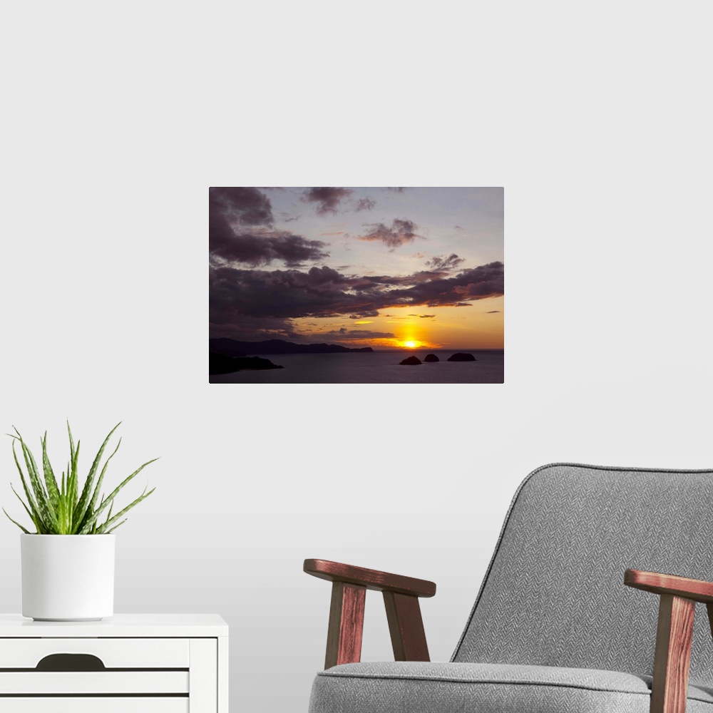 A modern room featuring Sunset over the Pacific ocean, Hermosa Bay, Gulf Of Papagayo, Guanacaste, Costa Rica