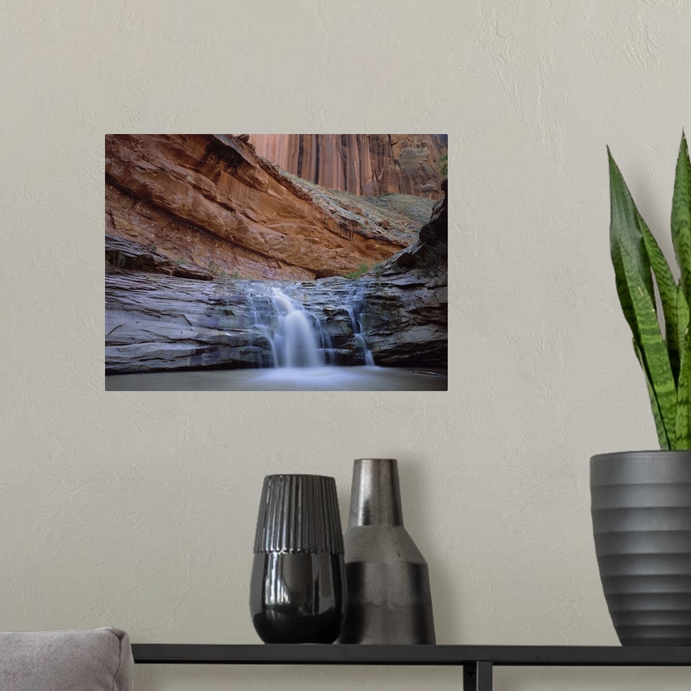 A modern room featuring Waterfall in Coyote Gulch in the Escalante Grand Staircase National Monument, Utah.