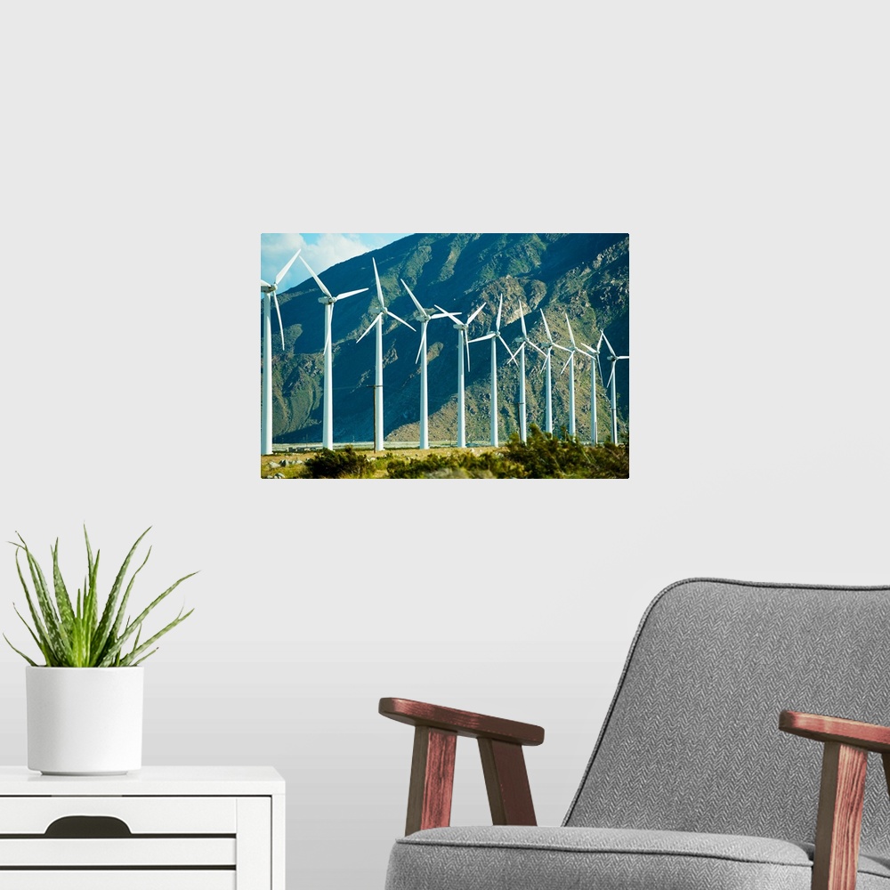 A modern room featuring Wind turbines in front of a mountain, Palm Springs, California