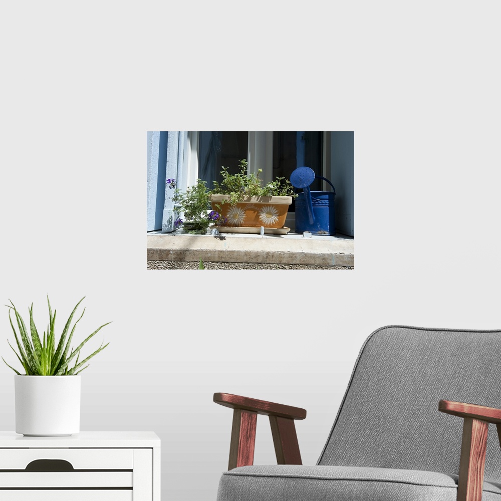 A modern room featuring Window box and a watering can on a window, Ansouis, Vaucluse