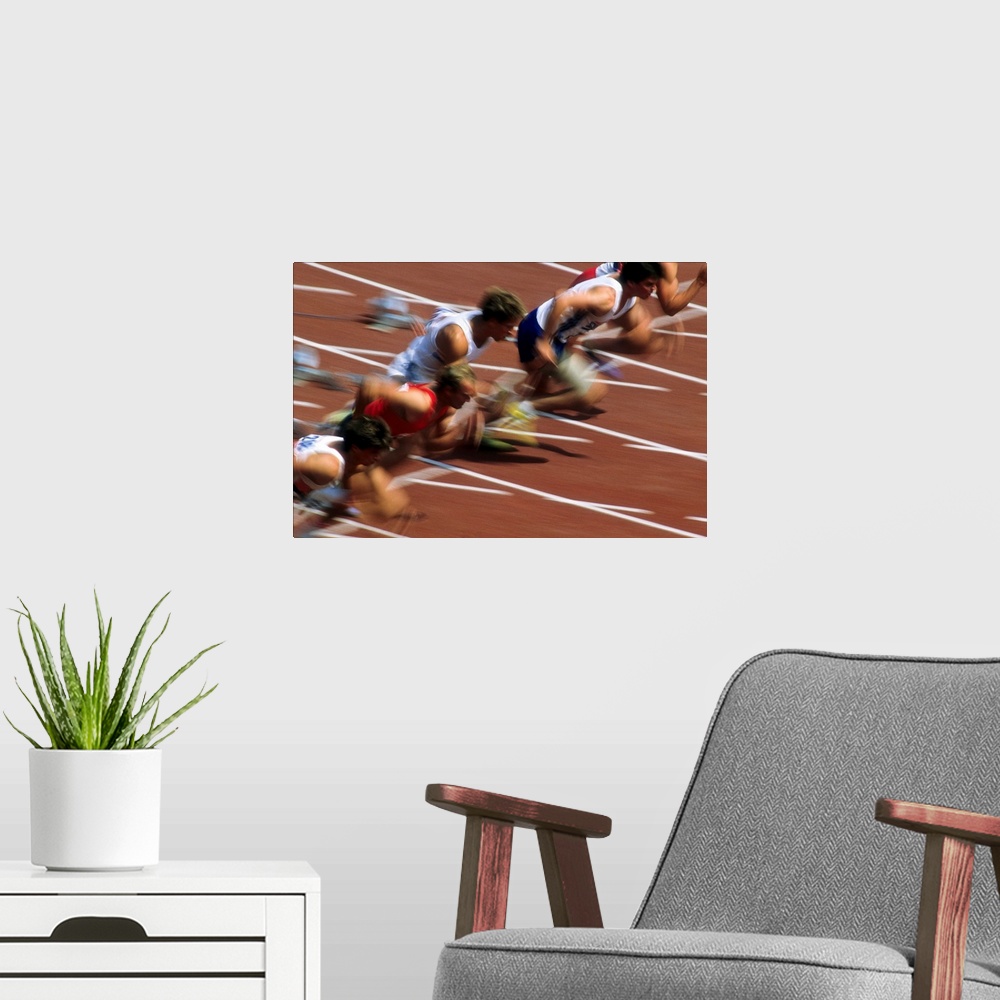 A modern room featuring Blurred action of men's 100 meter sprint race.