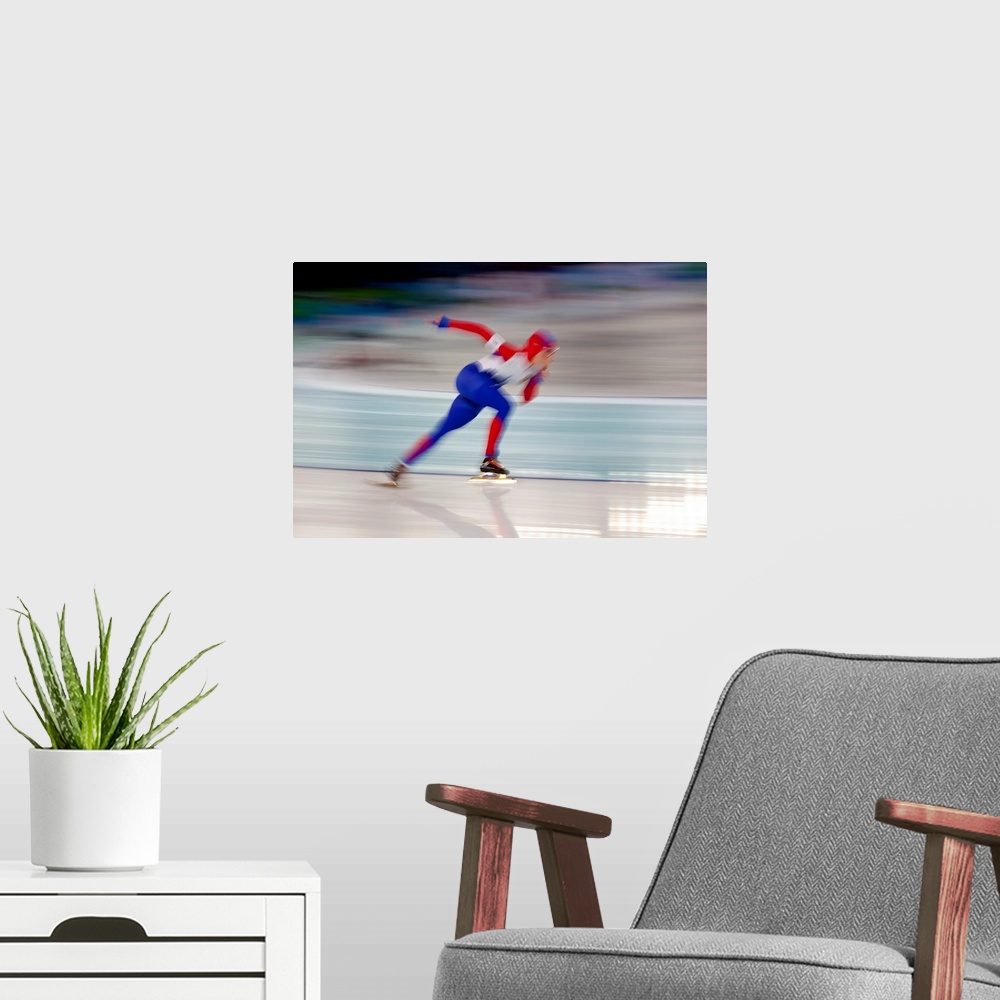 A modern room featuring Female speed skating in action