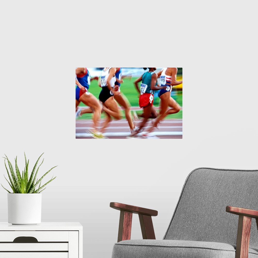 A modern room featuring Women's track and field race