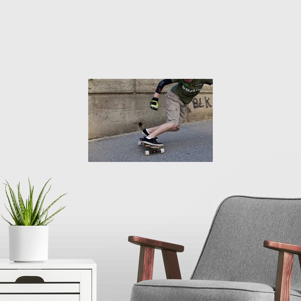 A modern room featuring Young male skateboarder on urban street