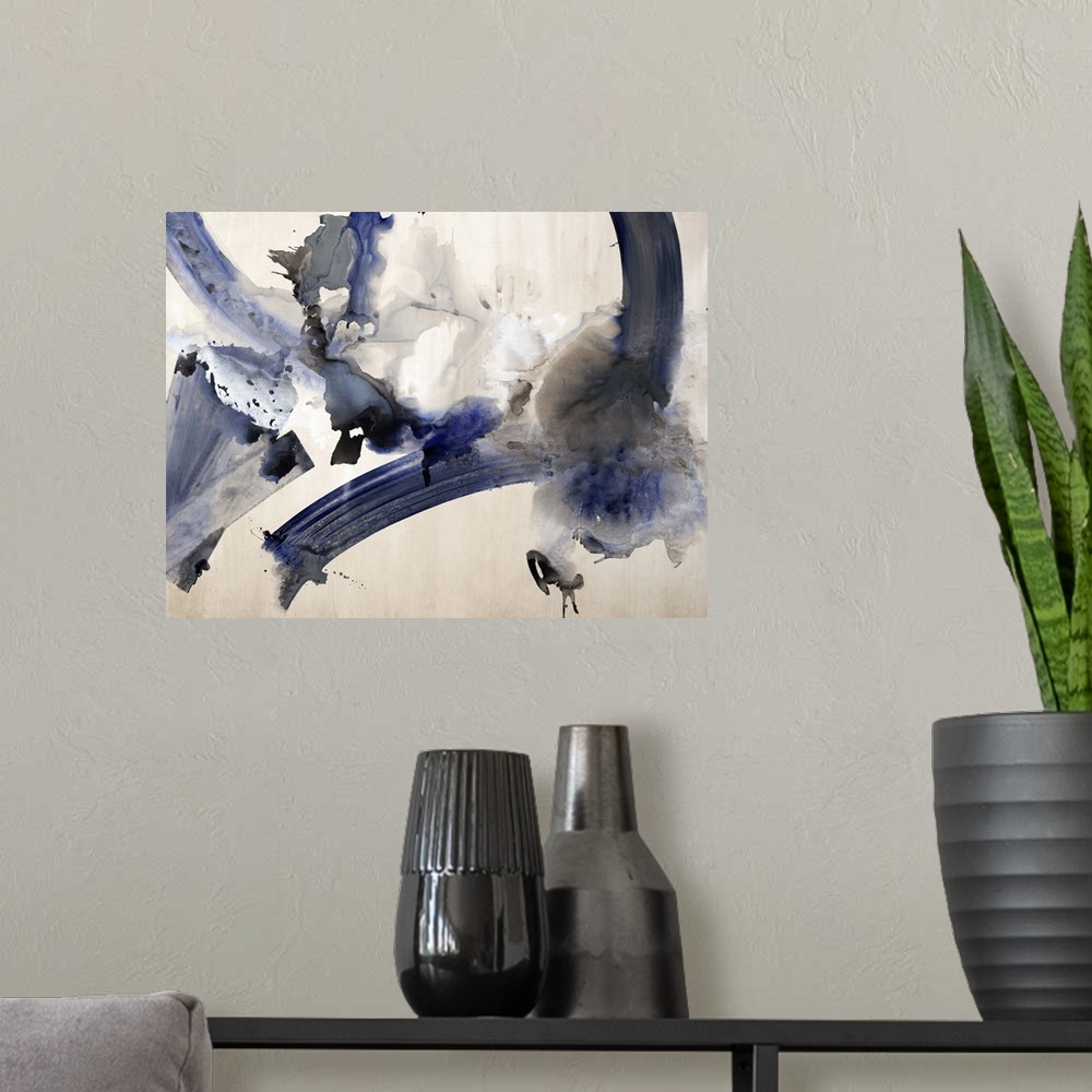 A modern room featuring Abstract watercolor painting with dark blue and black hues.