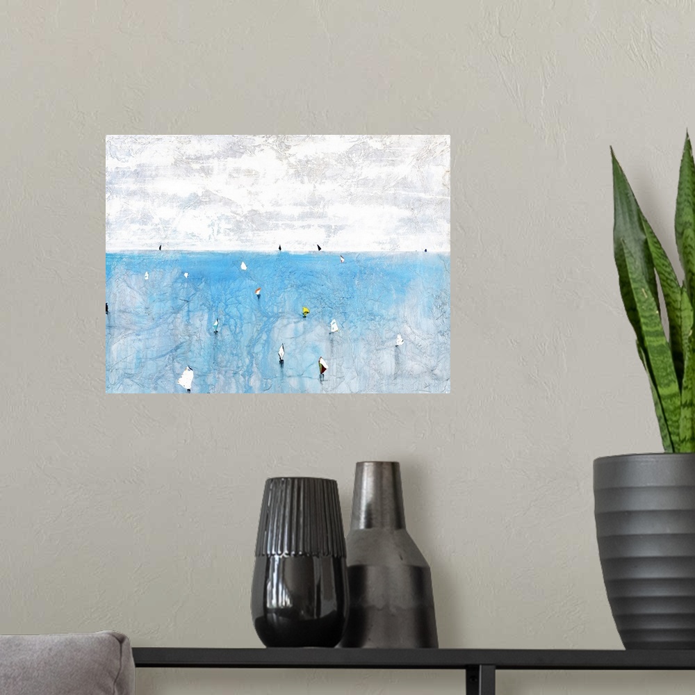A modern room featuring Contemporary abstract painting using pale colors to make a sea filled sailboats.