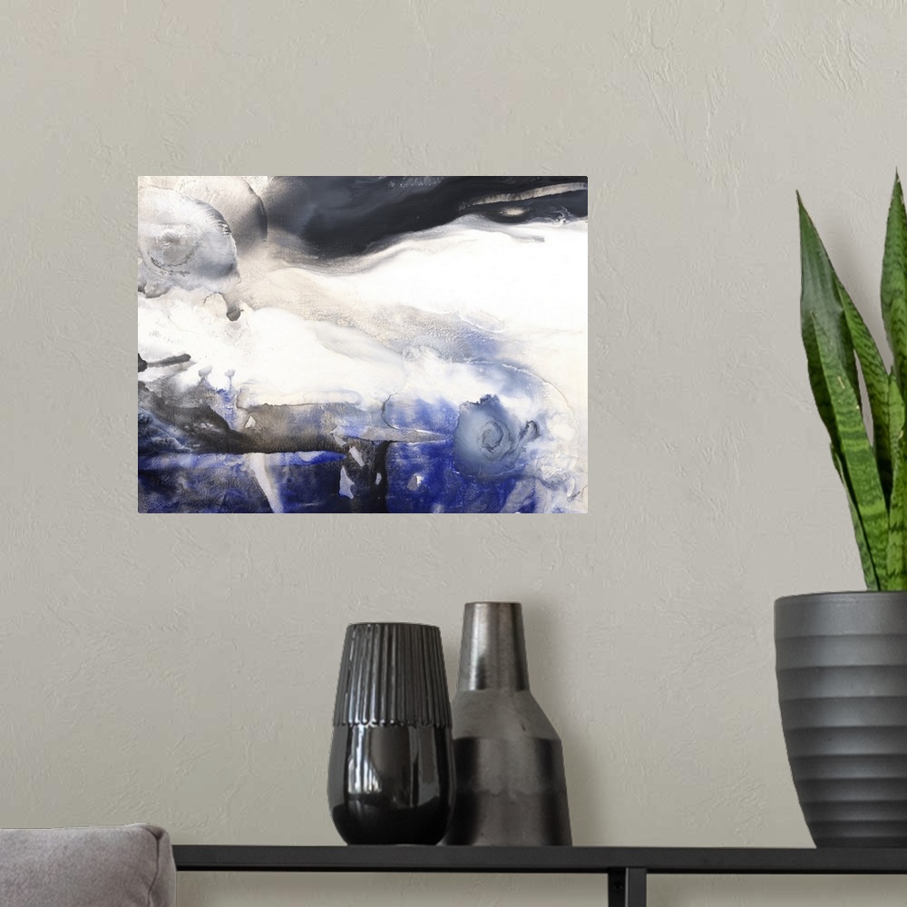 A modern room featuring Whirled colors of white, black and blue, giving the impression of a thunderless storm.