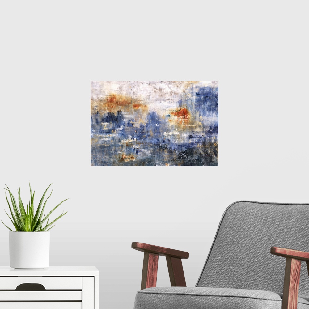 A modern room featuring Large abstract art with shades of blue, orange, and gray.