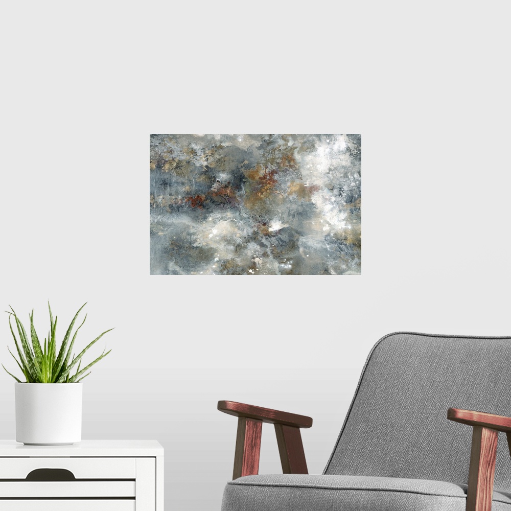 A modern room featuring Large abstract painting with blue, tan, white, gold, bronze, and silver hues.